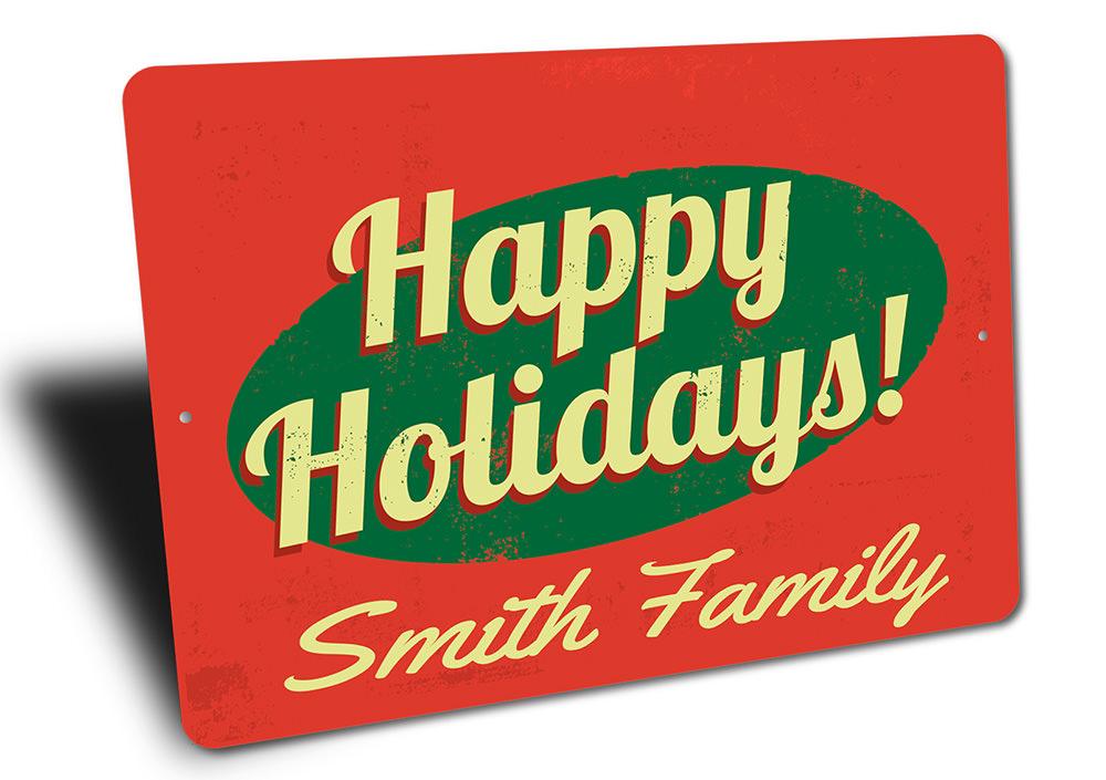 Happy Holidays Family Name Sign made of aluminum, featuring festive design for Christmas decorations.