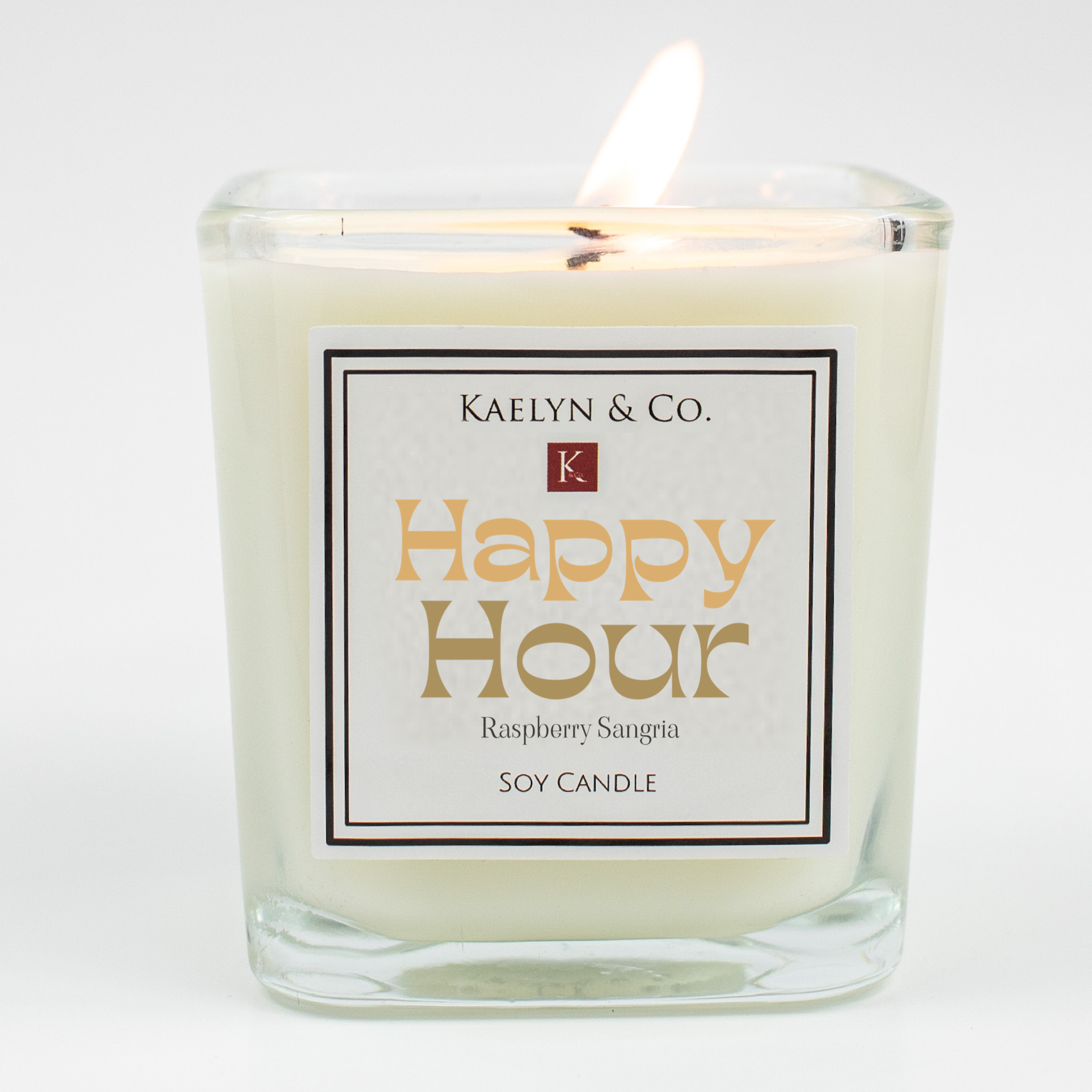 Happy Hour Limited Edition Candle with fruity scents of raspberries, cherries, and sweet red wine, elegantly packaged in a gift box.