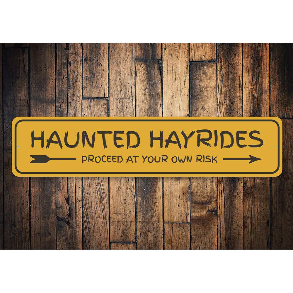 Haunted Hayrides Arrow Sign featuring spooky design, made of durable aluminum, perfect for Halloween decor.