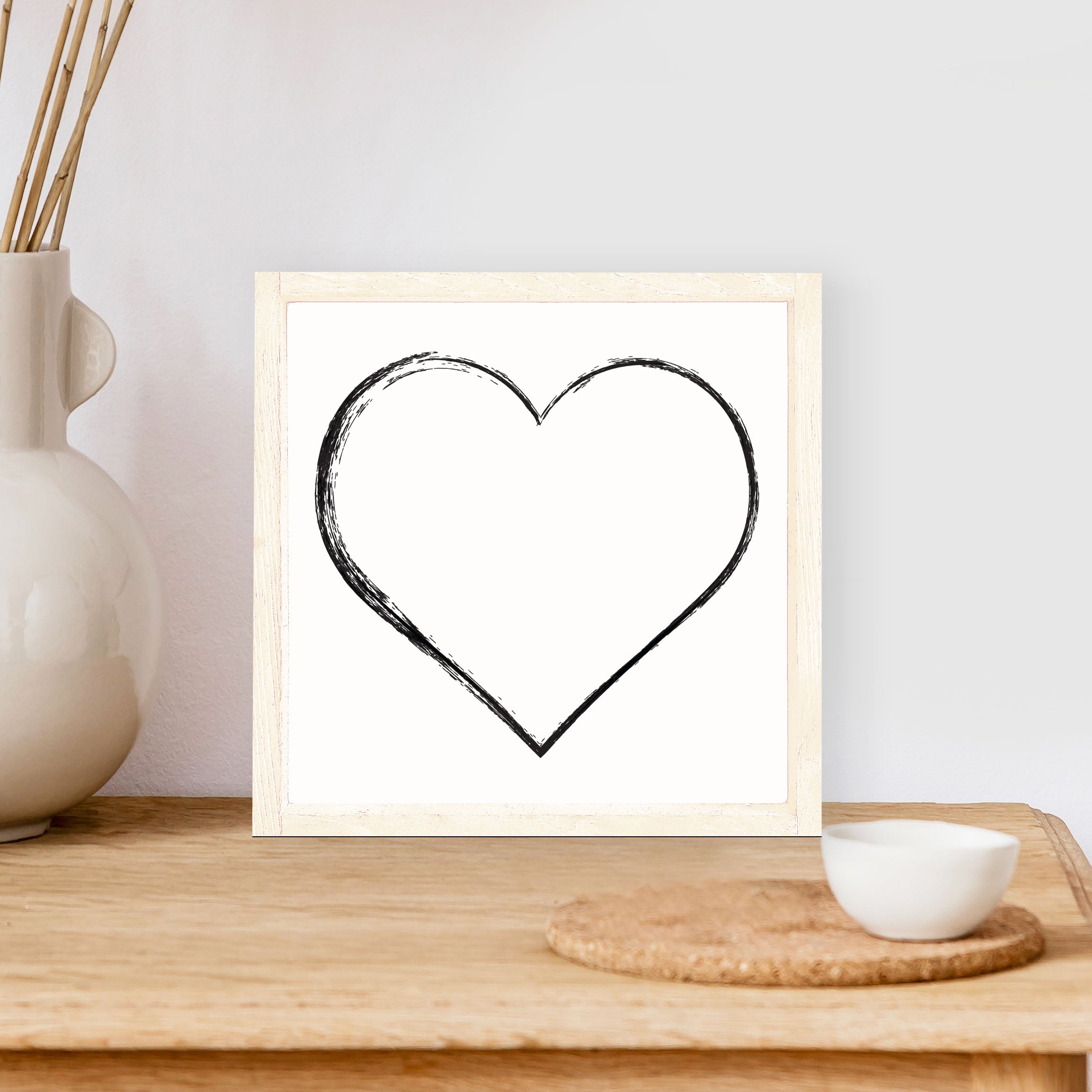 A charming Heart Wood Sign measuring 8x8 inches, featuring a stained pine wood frame and waterproof black text on a white background.