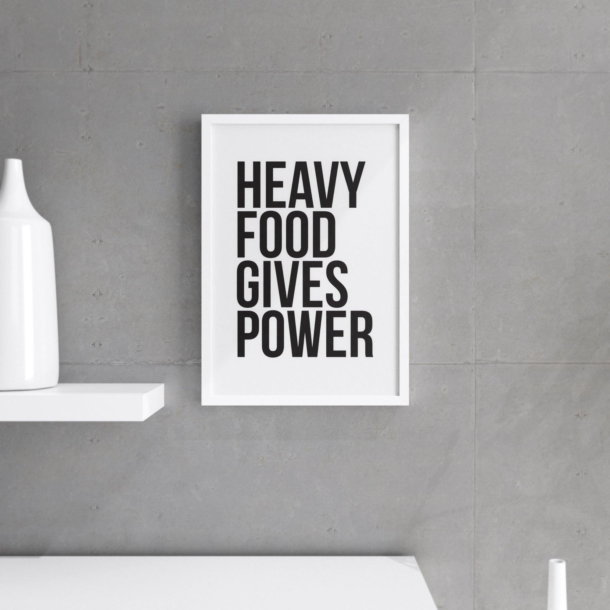 A vibrant wall print featuring the phrase 'Heavy Food Gives You Power', designed for kitchen decor, printed on premium paper.