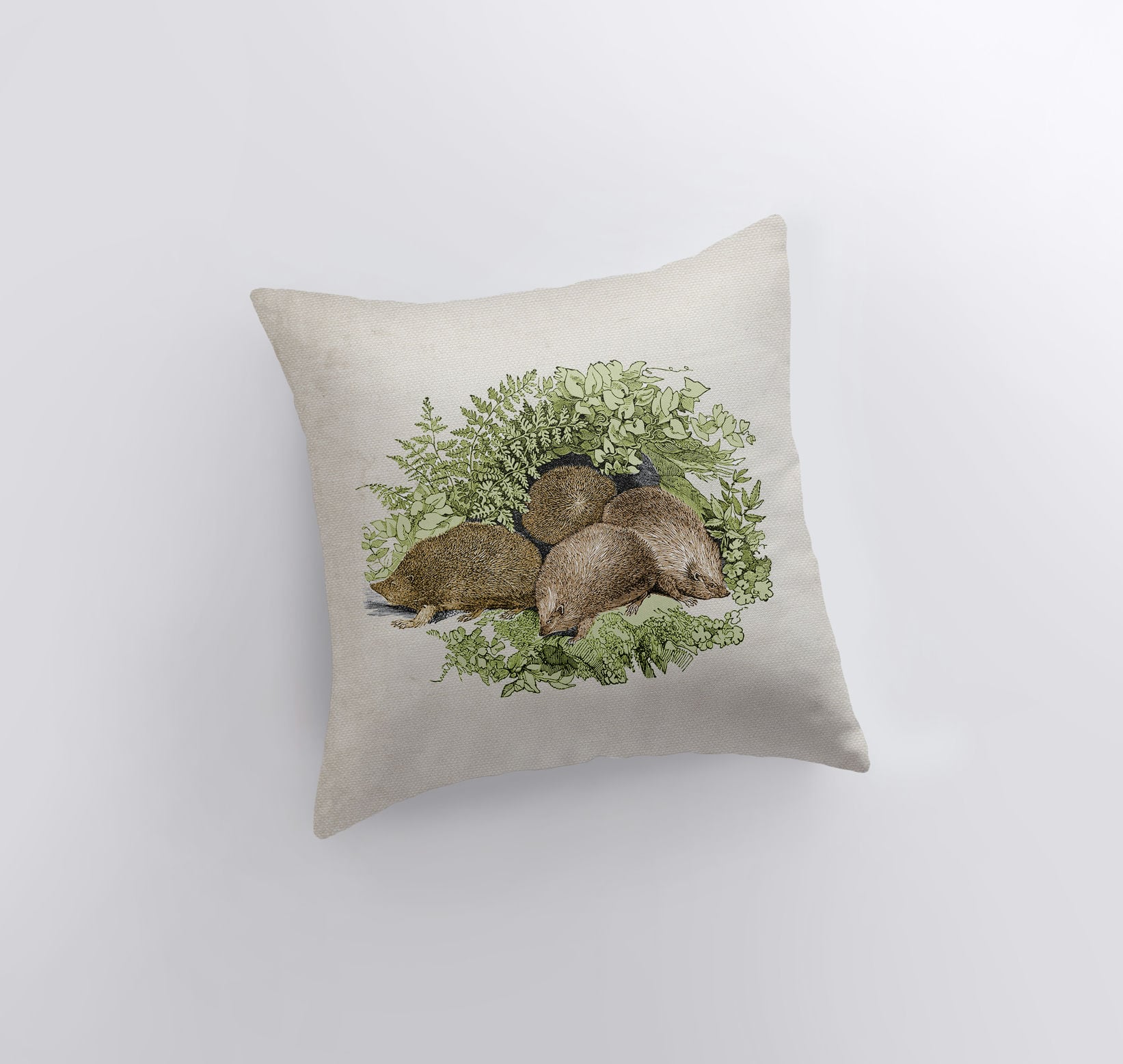 Handmade hedgehog pillow cover featuring a vintage hedgehog family design, beige back, and concealed zipper.