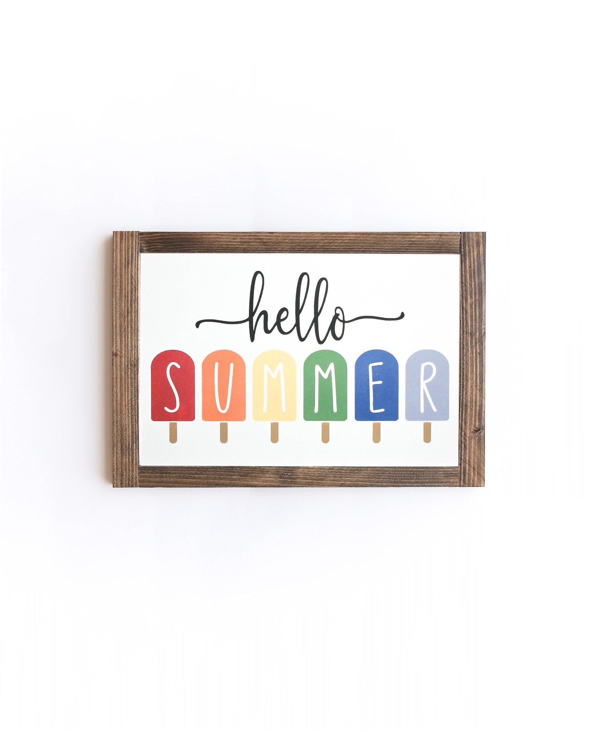 Hello Summer Wood Sign made from 100% wood, featuring a matte white background and cheerful lettering, perfect for summer decor.