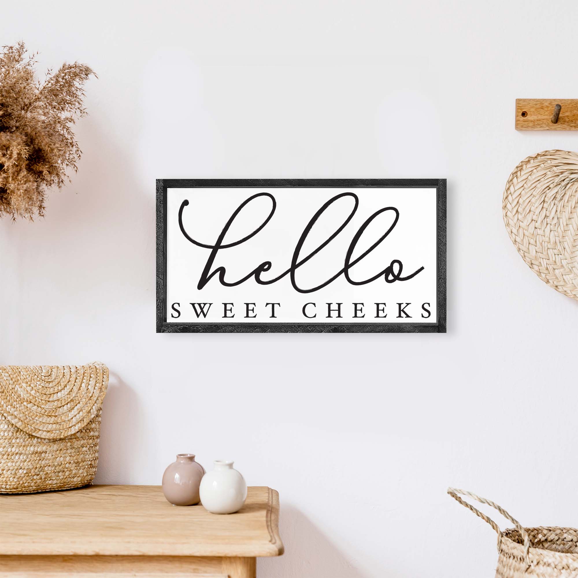 Hello Sweet Cheeks Wood Sign featuring a black text on a white background, framed in wood stain on pine, perfect for bathroom decor.