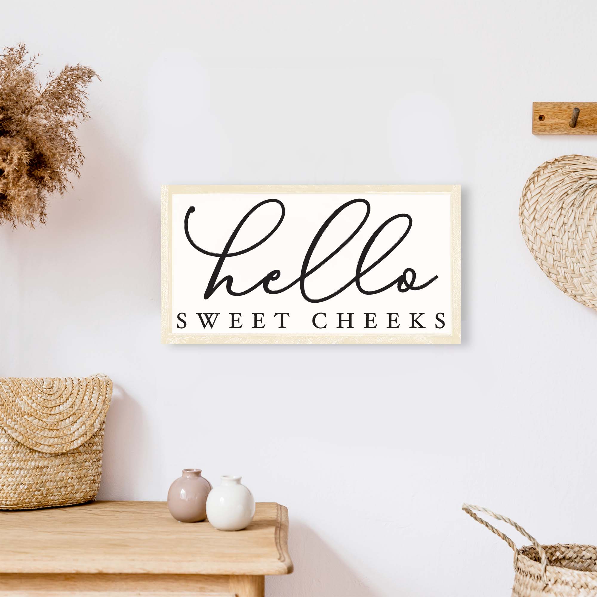 Hello Sweet Cheeks Wood Sign featuring a black text on a white background, framed in wood stain on pine, perfect for bathroom decor.