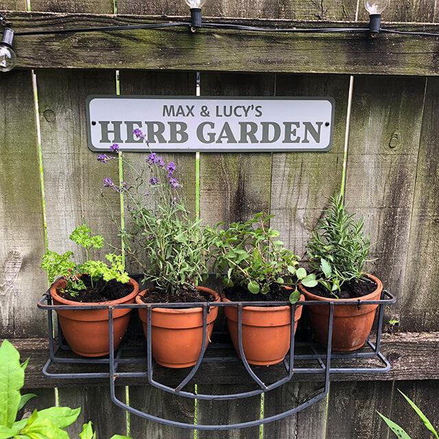 Customizable Herb Garden Sign made of high-quality aluminum, featuring pre-drilled holes for easy mounting.