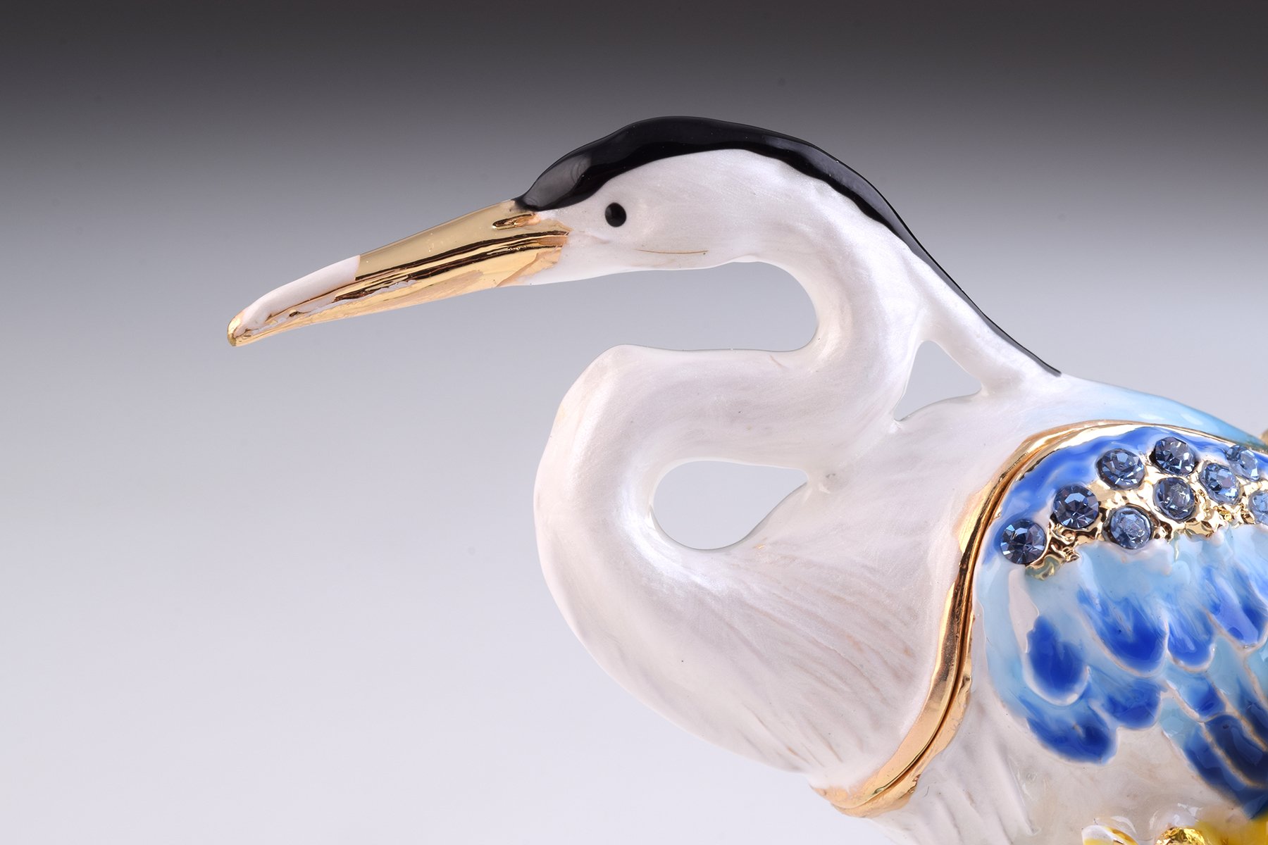 Handcrafted Heron Bird trinket box with Austrian crystals and gold plating, featuring a magnetic closure.