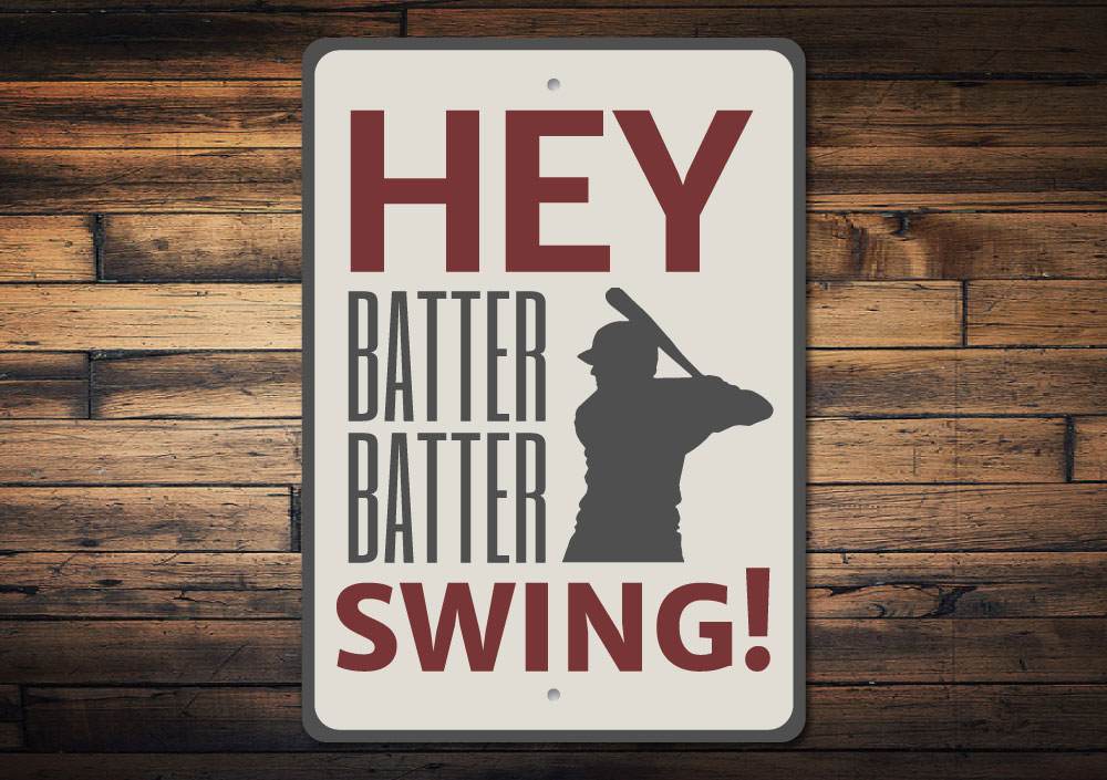 Hey Batter Batter Sign made of quality aluminum, featuring a playful design perfect for home decor.