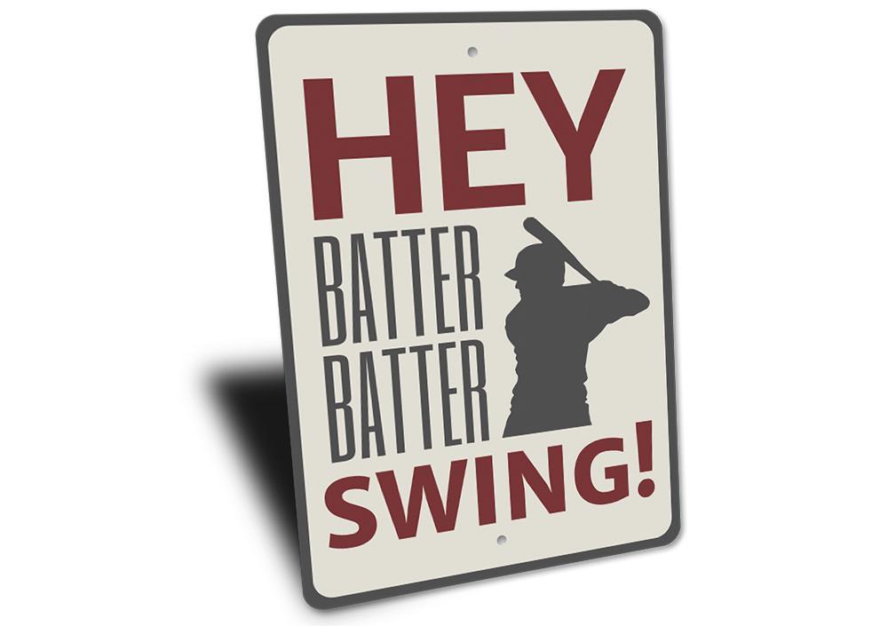 Hey Batter Batter Sign made of quality aluminum, featuring a playful design perfect for home decor.