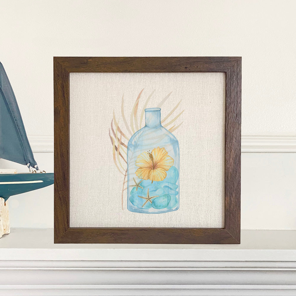 Hibiscus in a Bottle framed sign with a stylized wood frame, featuring eco-friendly ink printing on a linen-look background.