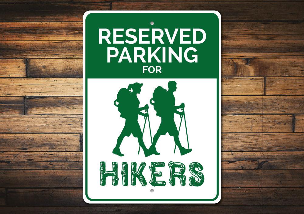 A customizable Hiker Parking Sign made of durable aluminum, featuring pre-drilled holes for easy mounting, showcasing various designs.