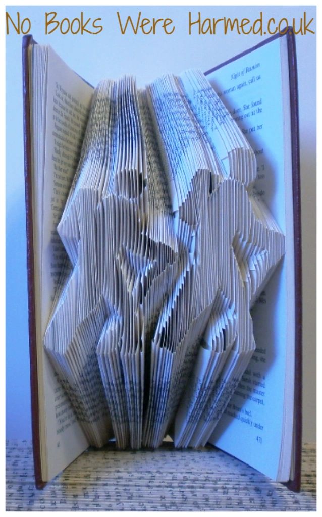 Handcrafted Hill Walkers book art made from vintage books, showcasing intricate folds and unique designs.