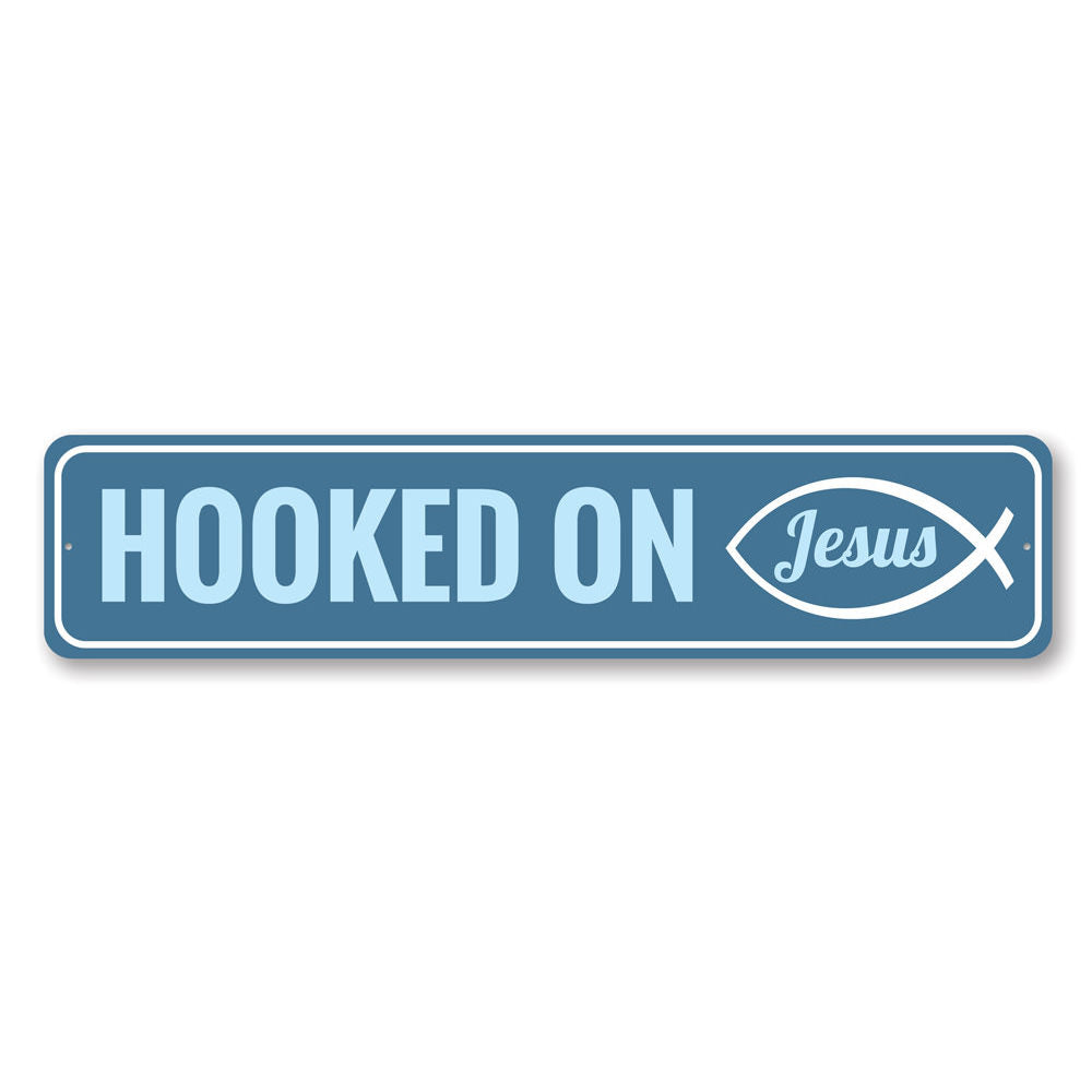 A decorative Hooked on Jesus Sign made of high-quality aluminum, featuring a beautiful design that adds a spiritual touch to any room.