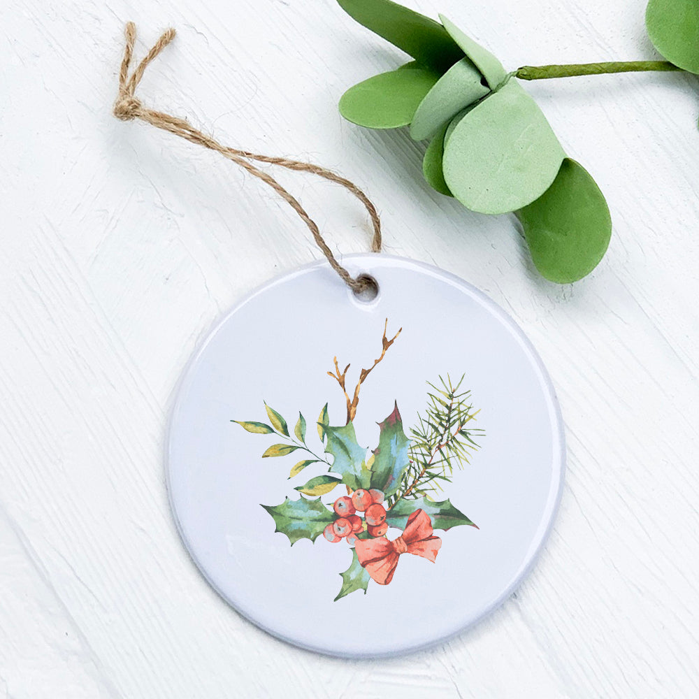 Holly Bundle with Bow porcelain ornament featuring vibrant design and smooth finish, perfect for holiday gifting.