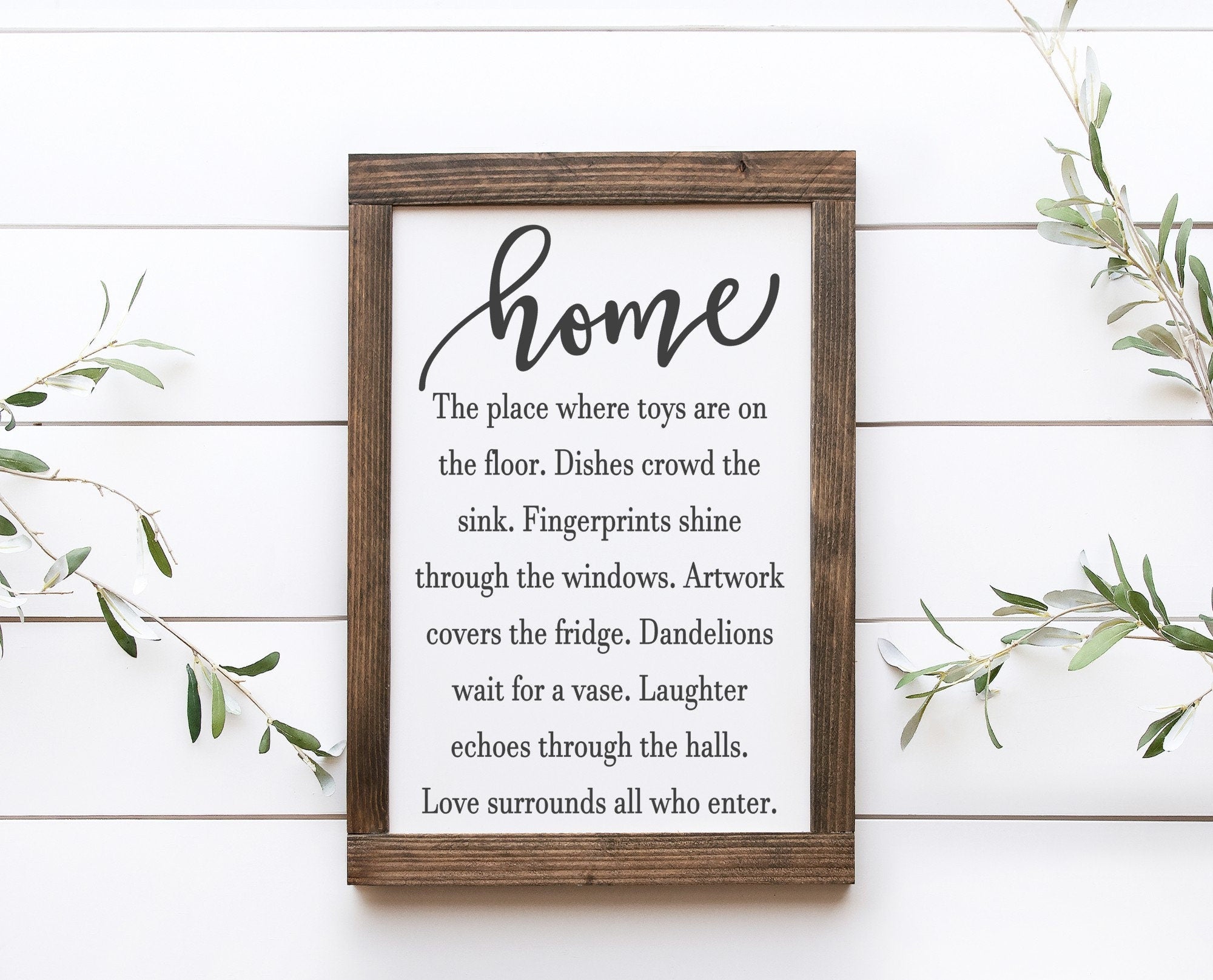 Handmade Home Description Wood Sign in matte white finish with unique wood grain and knots, featuring saw-tooth hangers for easy display.