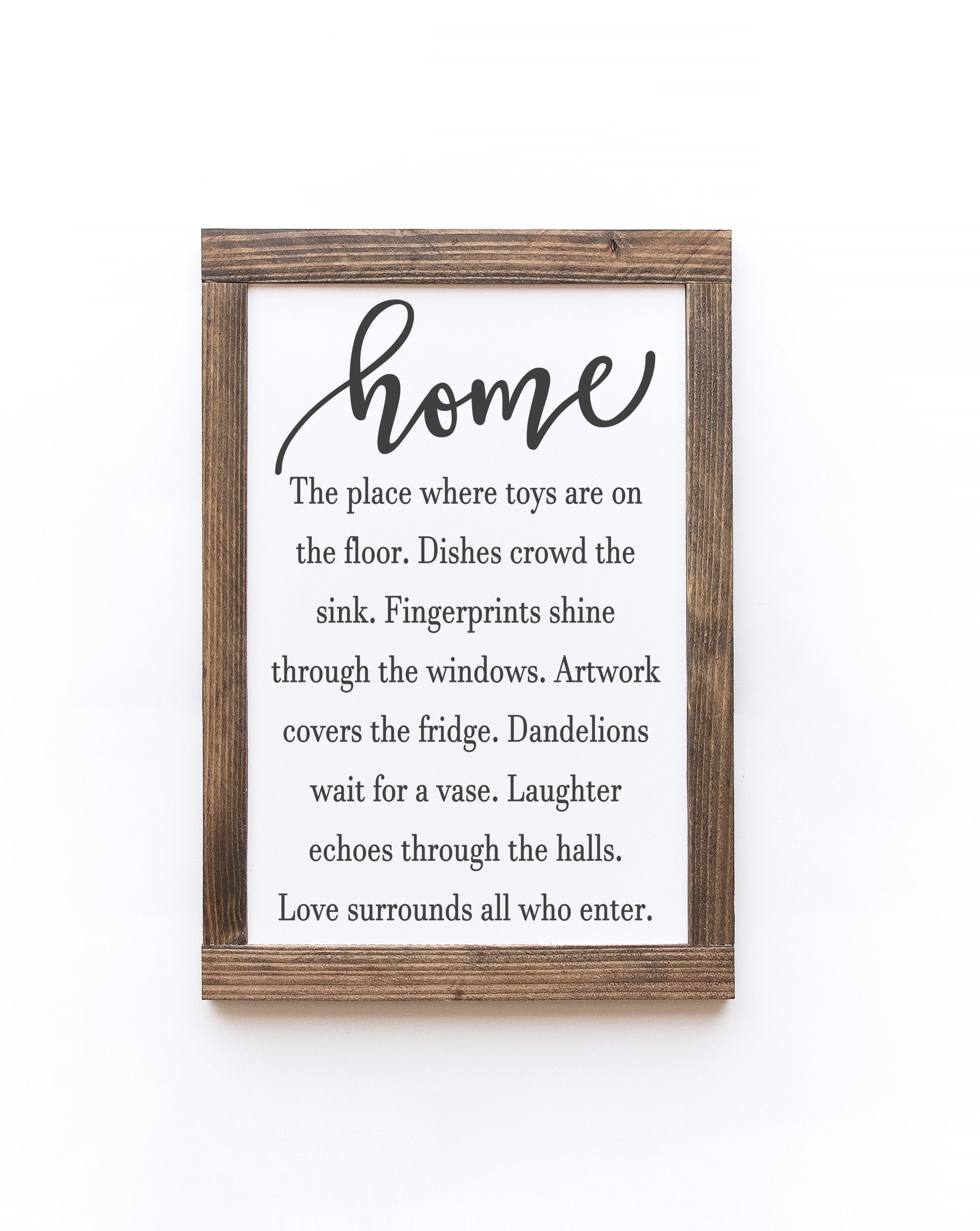 Handmade Home Description Wood Sign in matte white finish with unique wood grain and knots, featuring saw-tooth hangers for easy display.