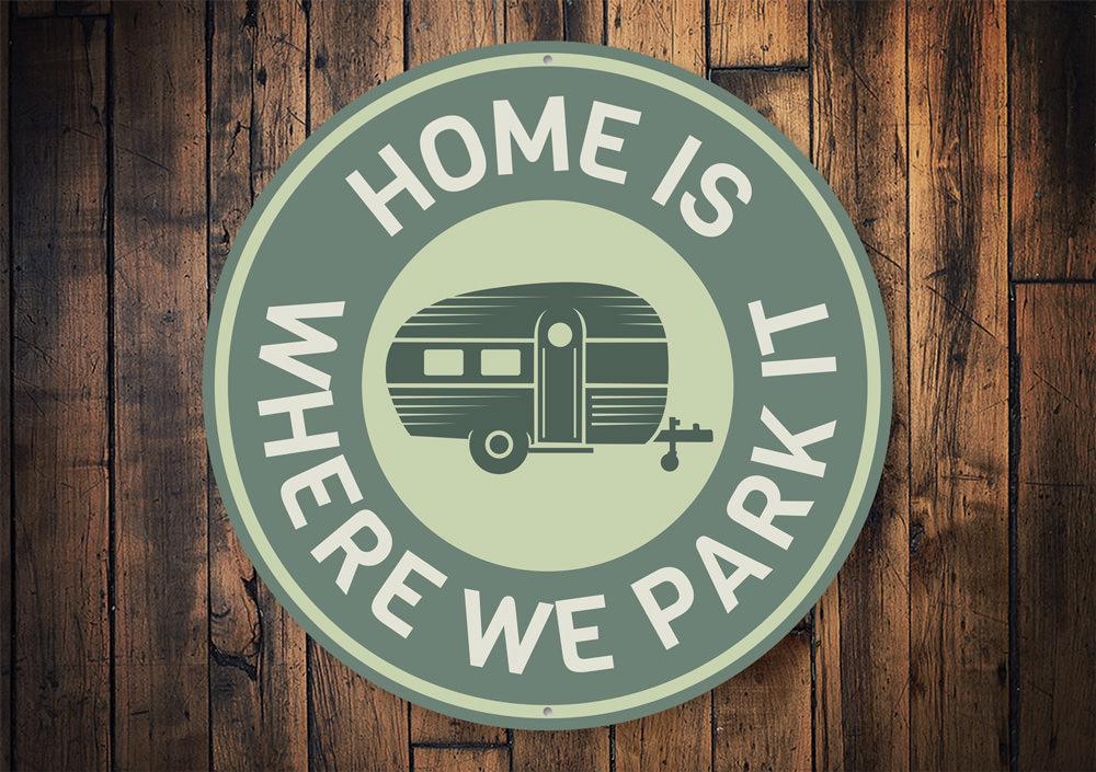 Home Is Where We Park It Sign made of durable aluminum, featuring a charming design suitable for home decor.