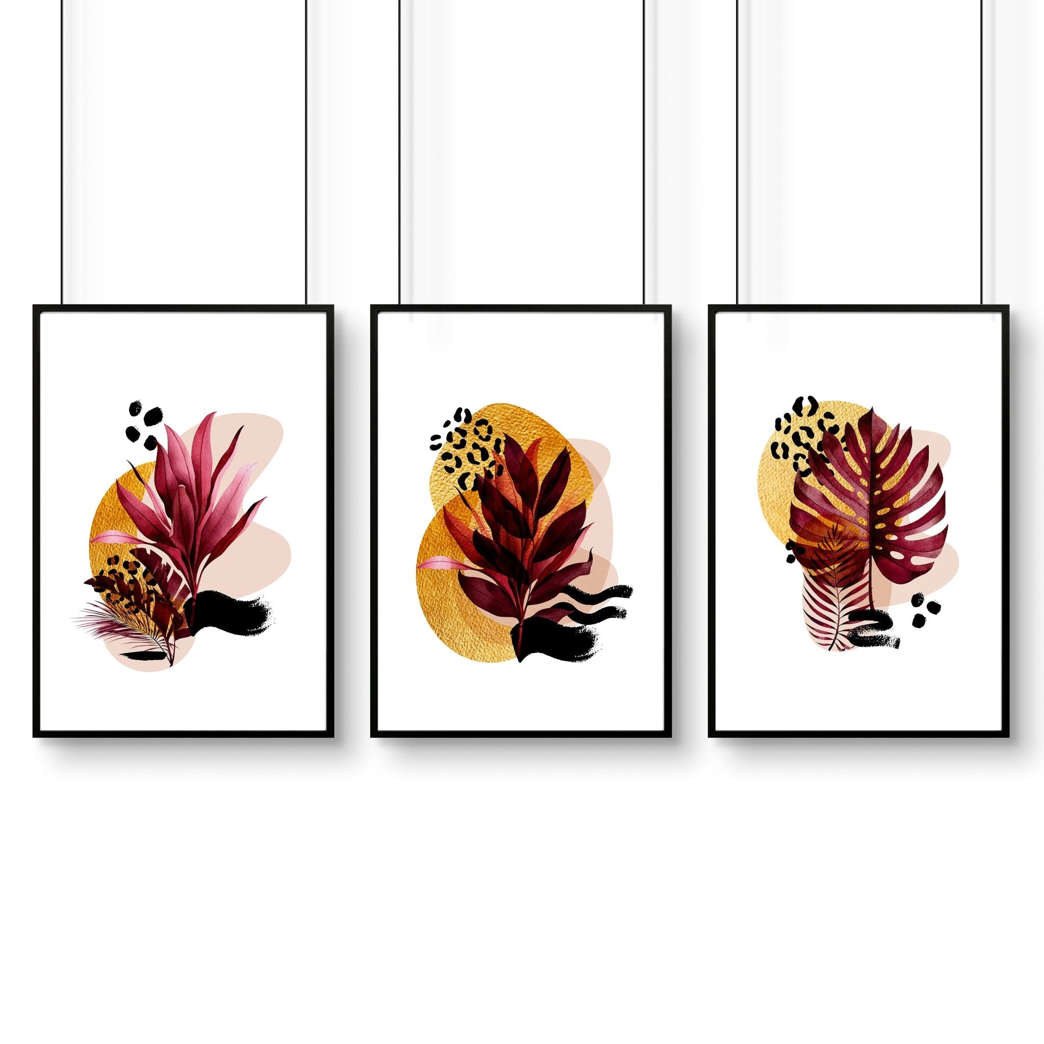 Set of 3 framed wall art prints featuring vibrant botanical designs in burgundy, black, and gold tones, perfect for home office decor.