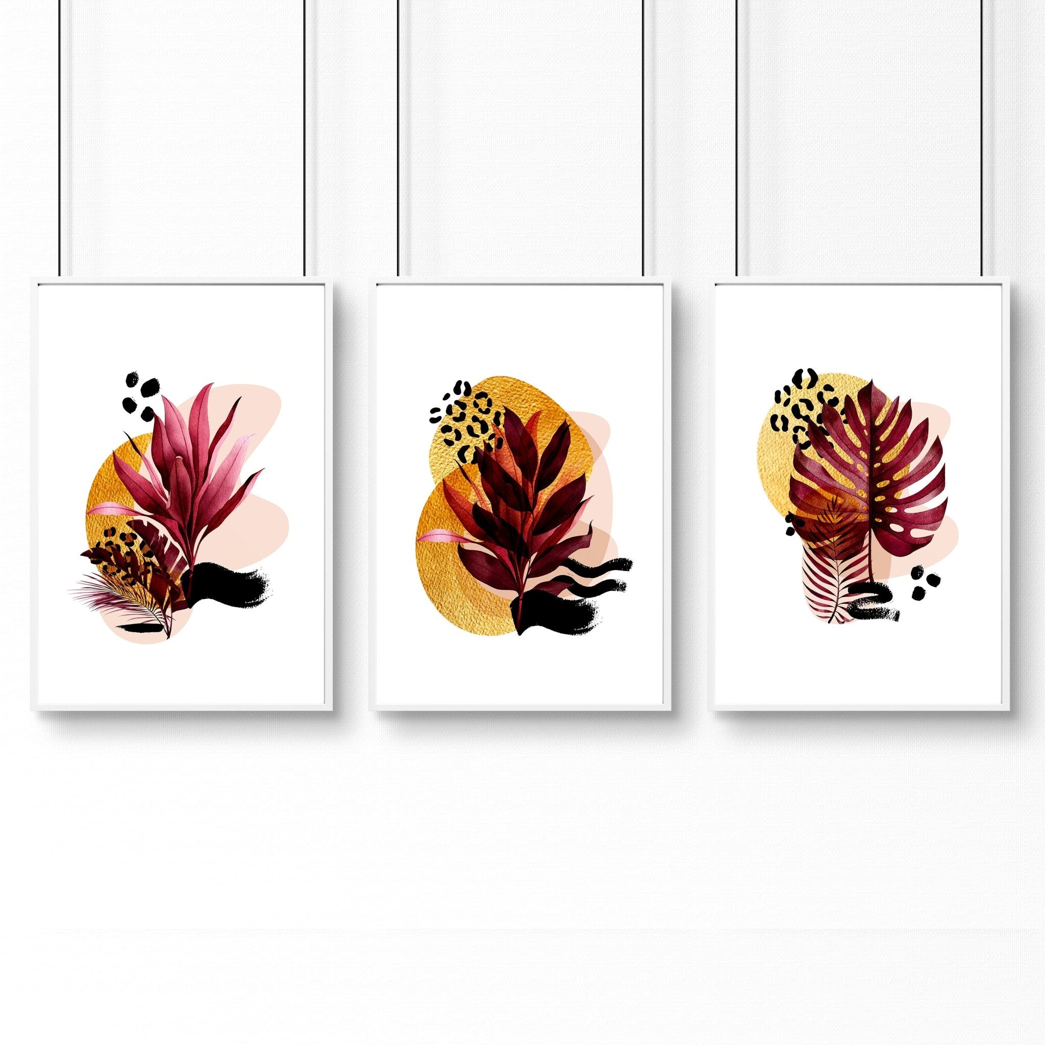 Set of 3 framed wall art prints featuring vibrant botanical designs in burgundy, black, and gold tones, perfect for home office decor.