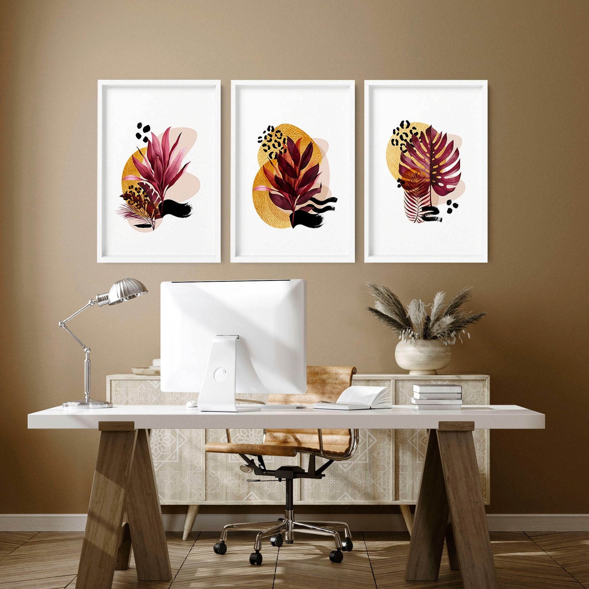 Set of 3 framed wall art prints featuring vibrant botanical designs in burgundy, black, and gold tones, perfect for home office decor.