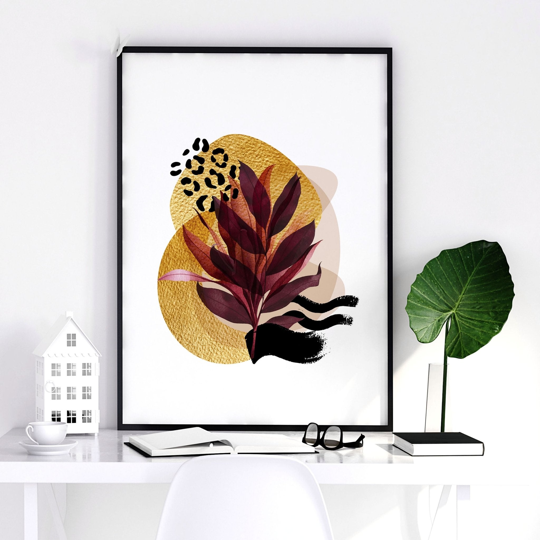 Set of 3 framed wall art prints featuring vibrant botanical designs in burgundy, black, and gold tones, perfect for home office decor.