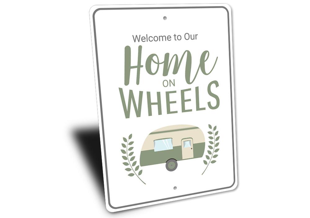 A decorative Home on Wheels Sign made of high-quality aluminum, featuring a unique design suitable for indoor and outdoor use.