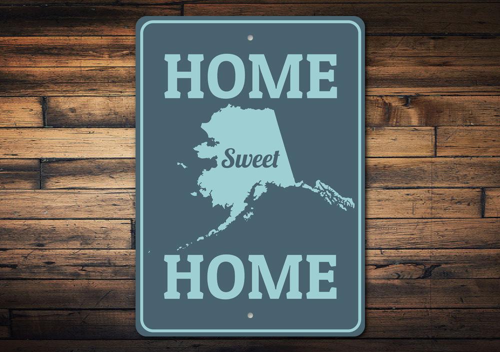 Home Sweet Home Alaska Sign made of high-quality aluminum, featuring a rustic design suitable for indoor and outdoor decor.