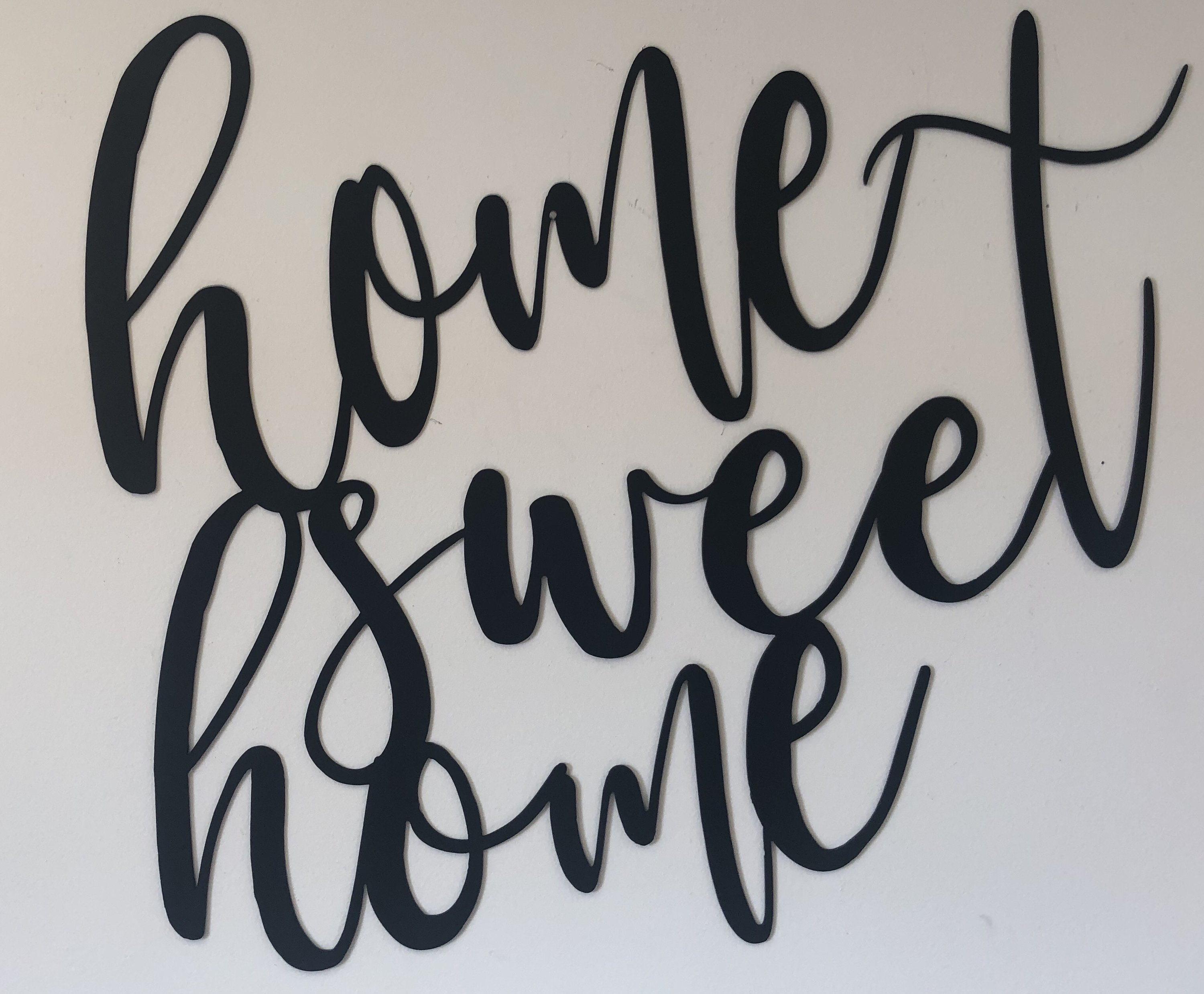 Home Sweet Home Cursive Metal Wall Art in black, elegantly designed for wall decor.