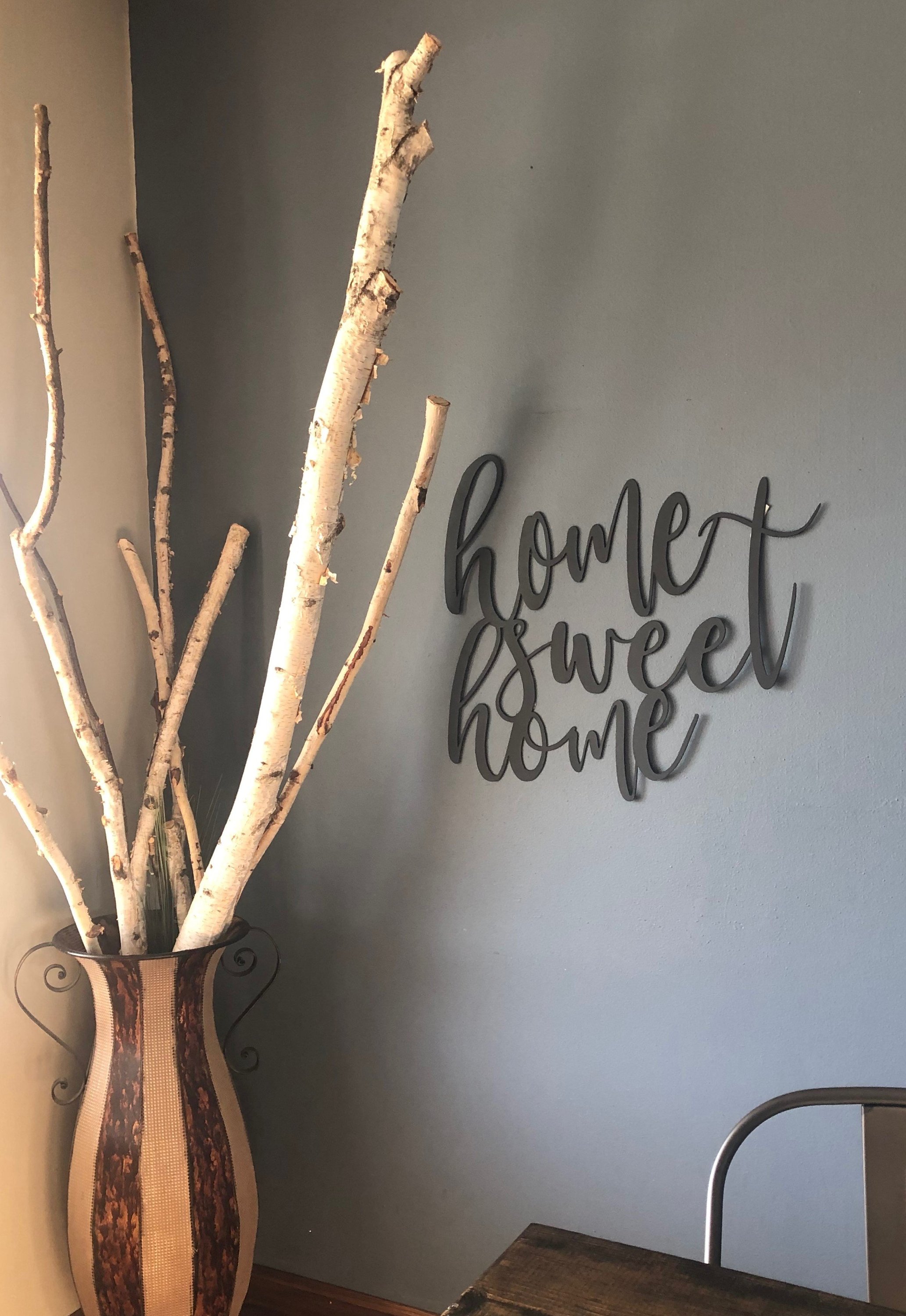 Home Sweet Home wall art sign in low gloss black finish, measuring 22 inches wide and 26 inches tall, perfect for home decor.