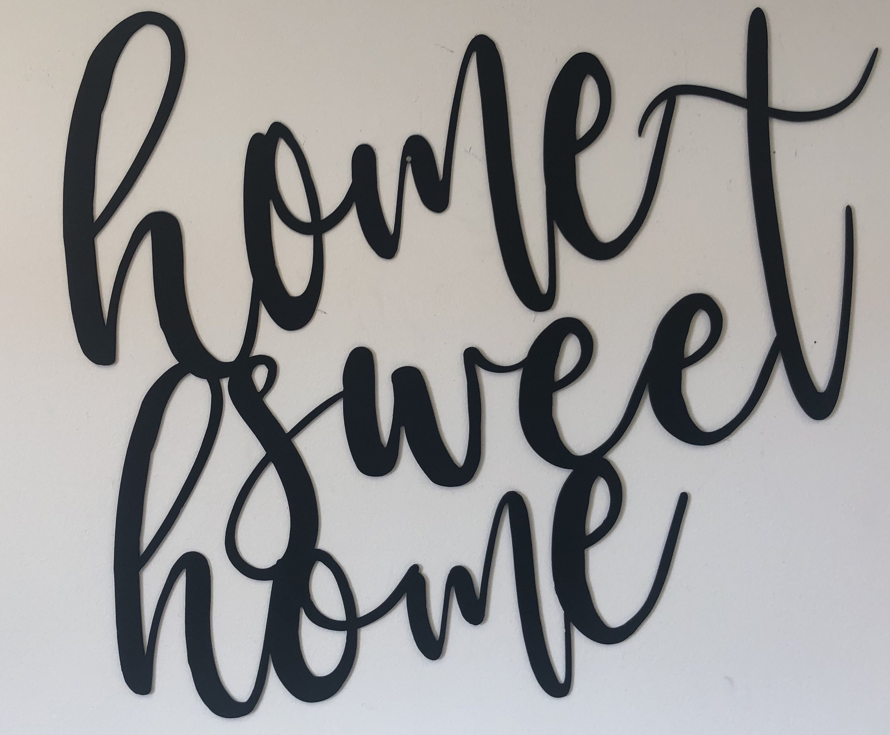 Home Sweet Home wall art sign in low gloss black finish, measuring 22 inches wide and 26 inches tall, perfect for home decor.