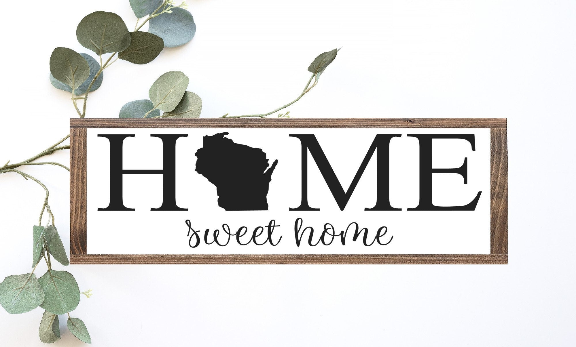 Home Sweet Home WI Wood Sign made from 100% wood with a matte white background and painted lettering, showcasing rustic charm.