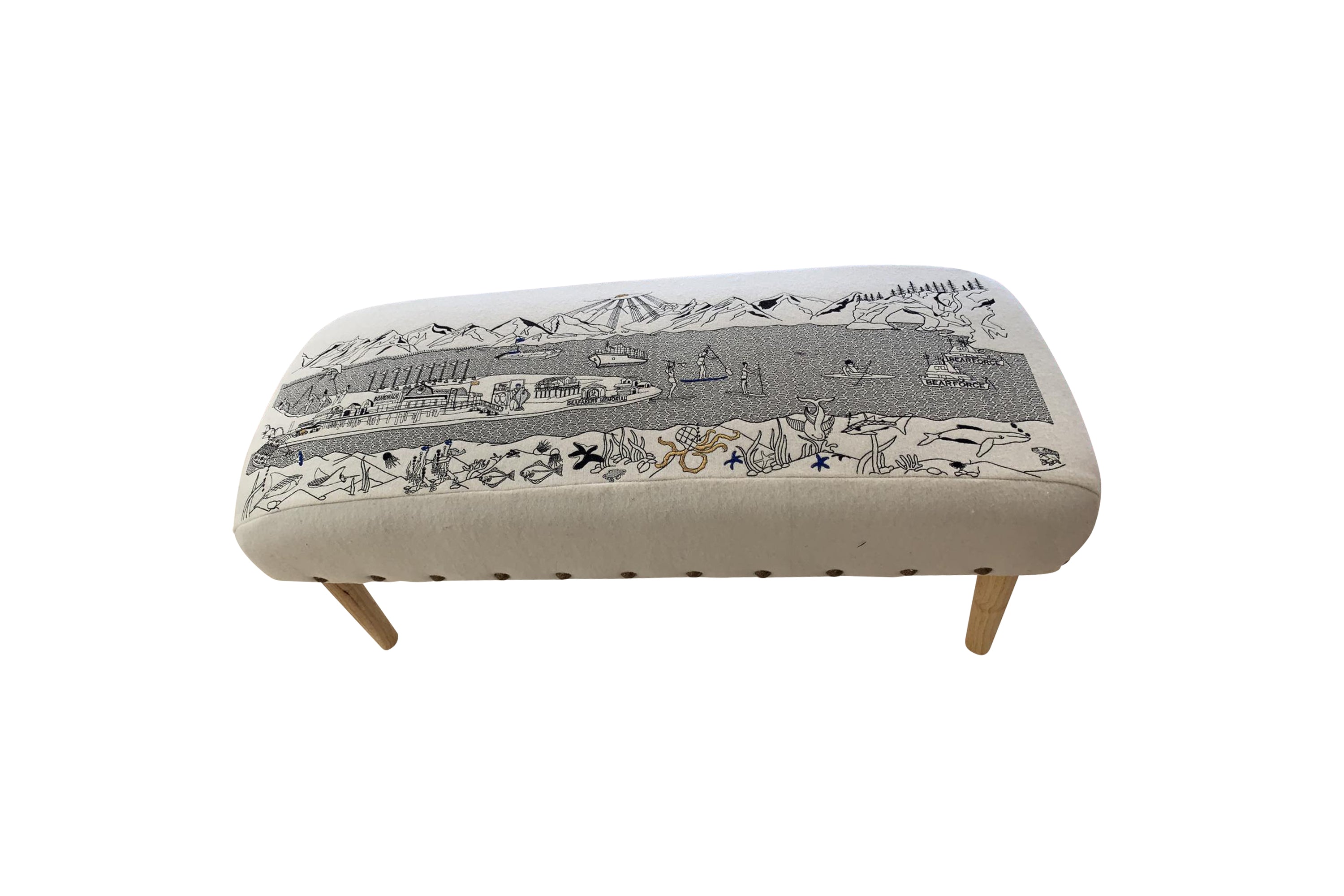 Homer Spit Ottoman featuring upholstered wool in a stylish design with rubberwood legs.