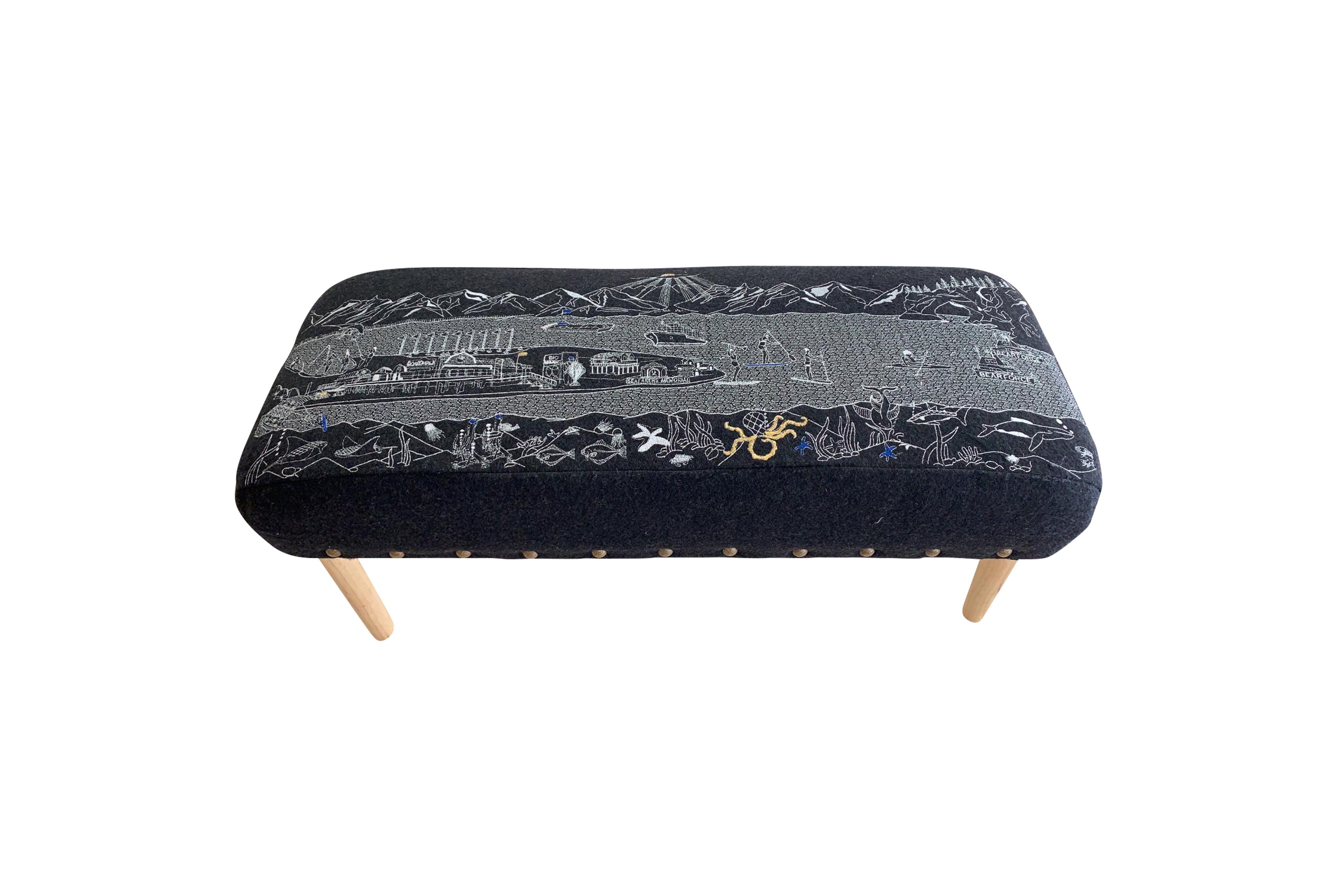 Homer Spit Ottoman featuring upholstered wool in a stylish design with rubberwood legs.