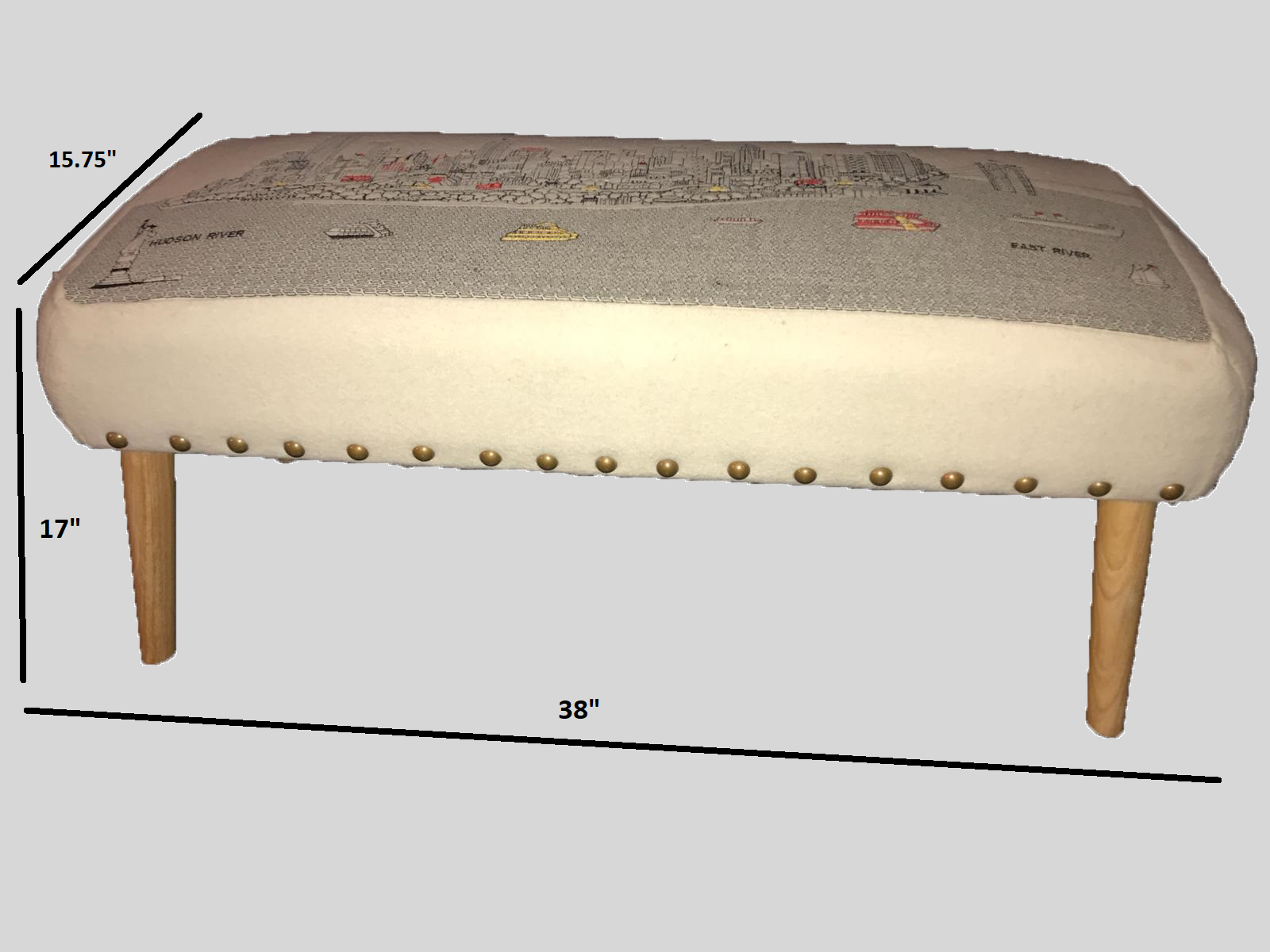 Homer Spit Ottoman featuring upholstered wool in a stylish design with rubberwood legs.