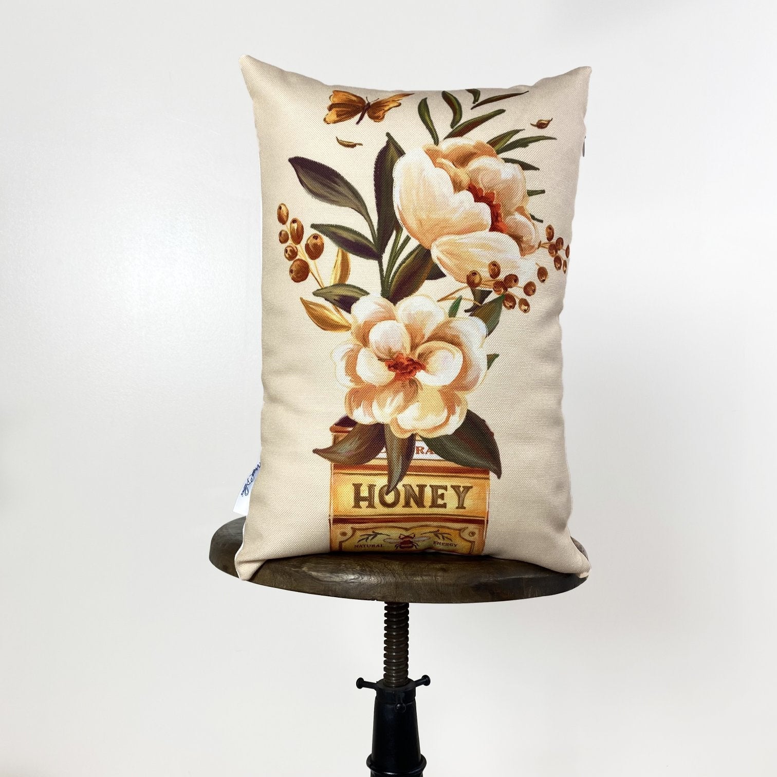 Honey Pot Tin Flowers accent pillow featuring a vintage floral design on a beige background with a concealed zipper closure.