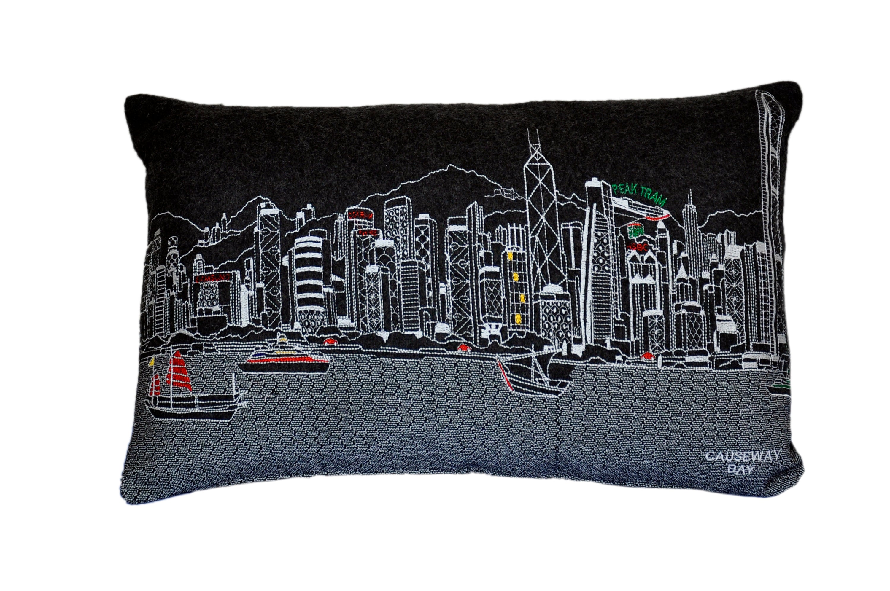 Decorative pillow featuring the iconic skyline of Hong Kong with vibrant colors and details.