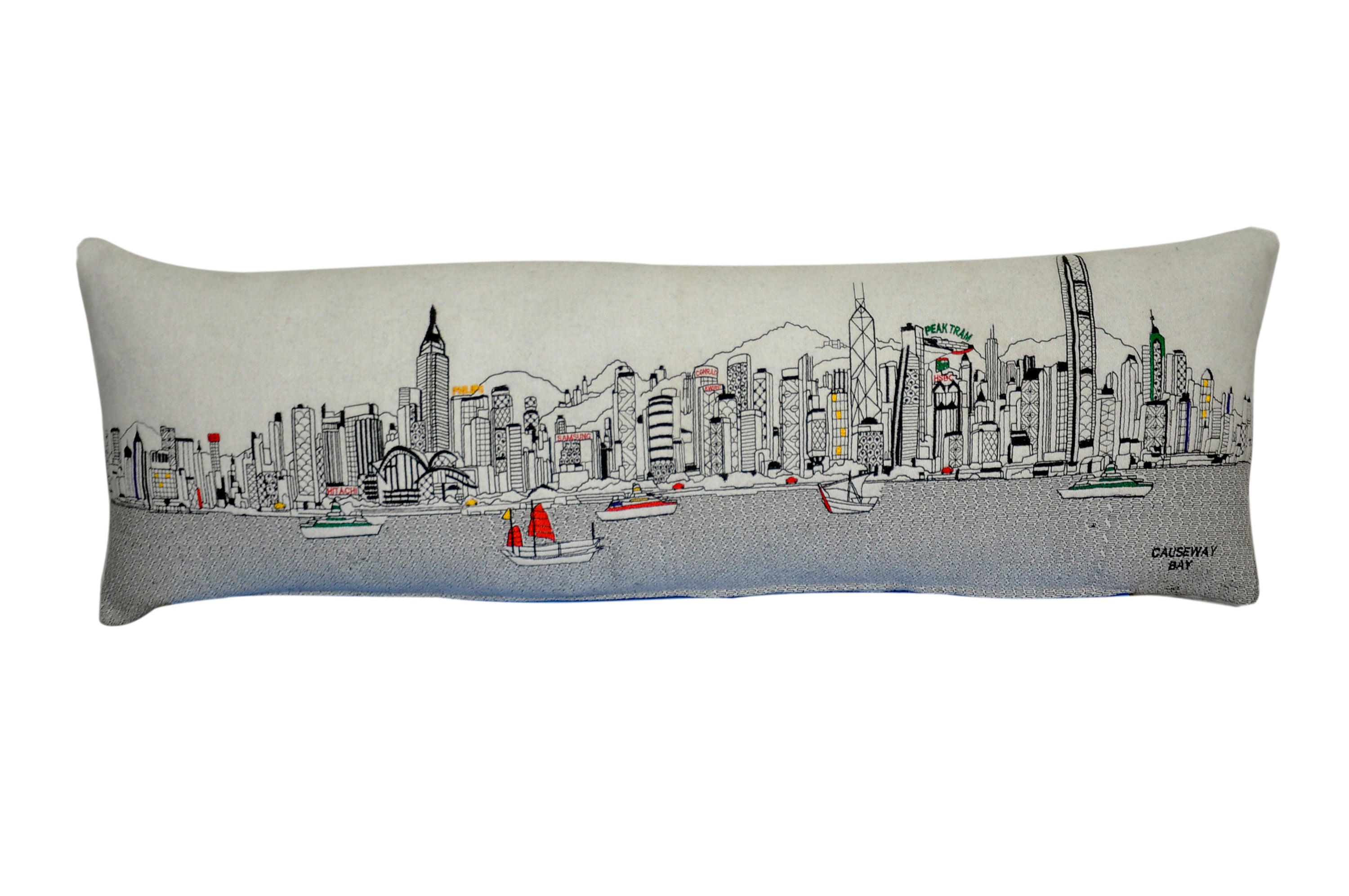 Decorative pillow featuring the iconic skyline of Hong Kong with vibrant colors and details.