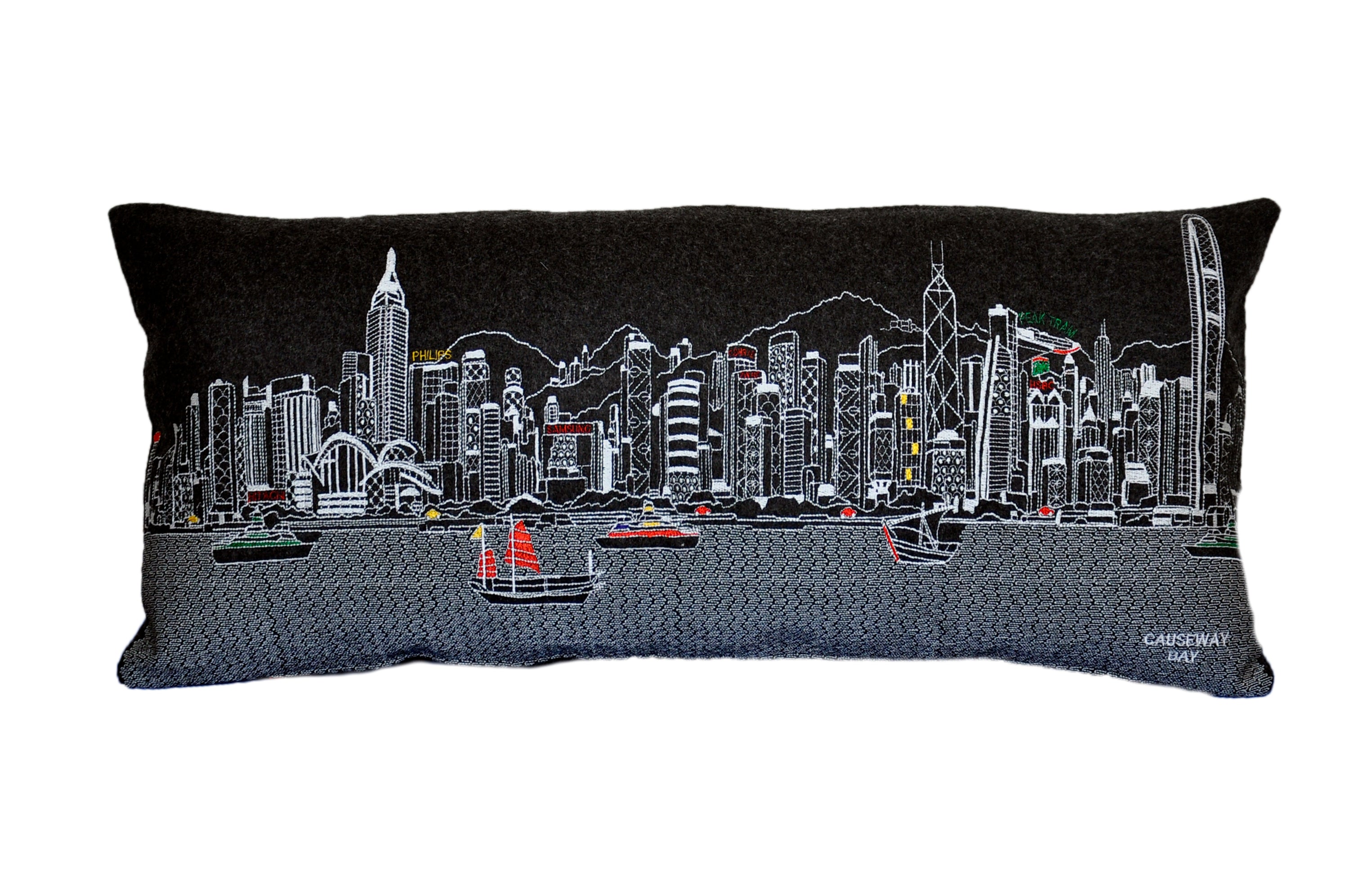 Decorative pillow featuring the iconic skyline of Hong Kong with vibrant colors and details.