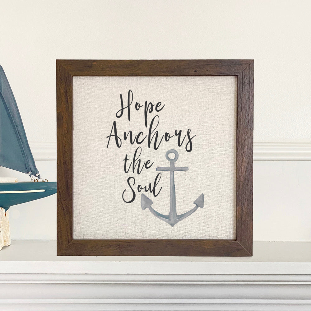 Hope Anchors the Soul framed sign with a natural wood frame and linen-look background, perfect for home decor.