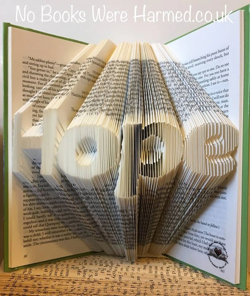 Hand folded book art titled 'Hope', showcasing intricate page folds from vintage books, perfect for home decor.