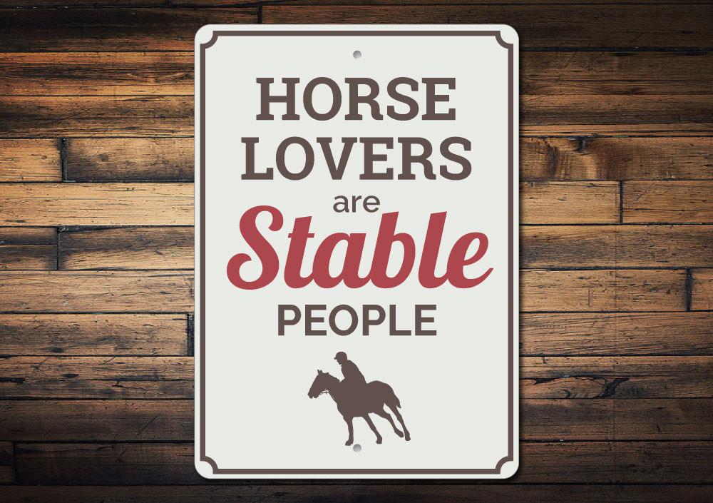 A decorative Horse Phrase Sign made of high-quality aluminum, featuring a rustic design suitable for indoor and outdoor decor.