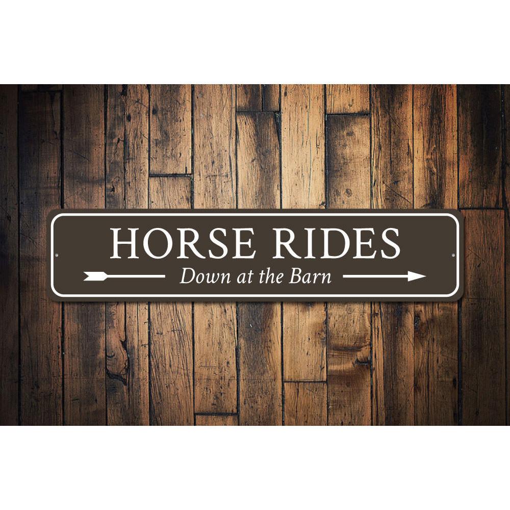 A decorative Horse Rides Sign made of high-quality aluminum, featuring customizable text and pre-drilled holes for easy mounting.