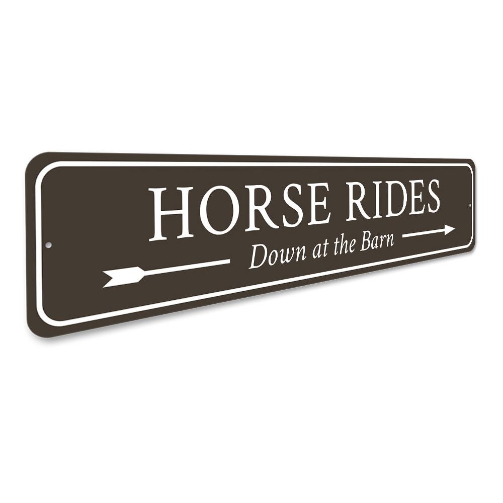 A decorative Horse Rides Sign made of high-quality aluminum, featuring customizable text and pre-drilled holes for easy mounting.