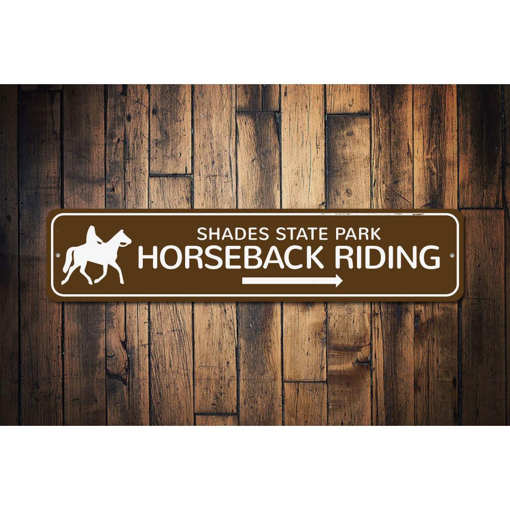 A decorative Horseback Riding Sign made of high-quality aluminum, featuring customizable text and pre-drilled holes for easy mounting.