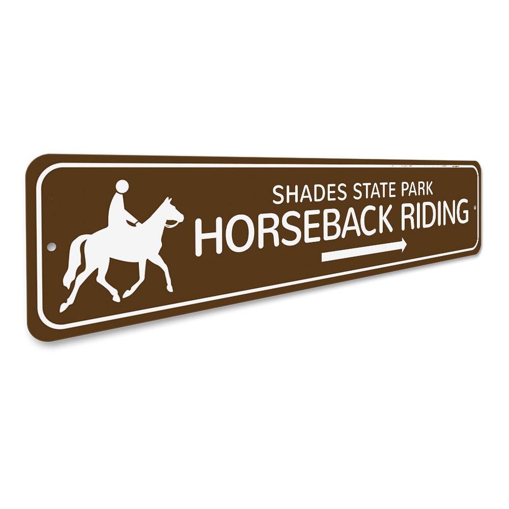 A decorative Horseback Riding Sign made of high-quality aluminum, featuring customizable text and pre-drilled holes for easy mounting.