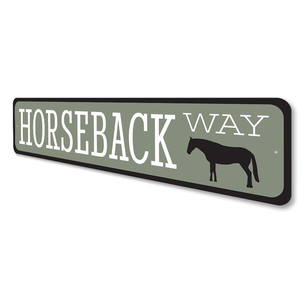 A decorative Horseback Way Sign made of durable aluminum, showcasing a rustic design perfect for lakehouses.