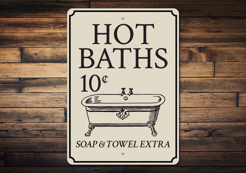 A decorative Hot Baths Sign made of high-quality aluminum, featuring customizable text and pre-drilled holes for easy mounting.