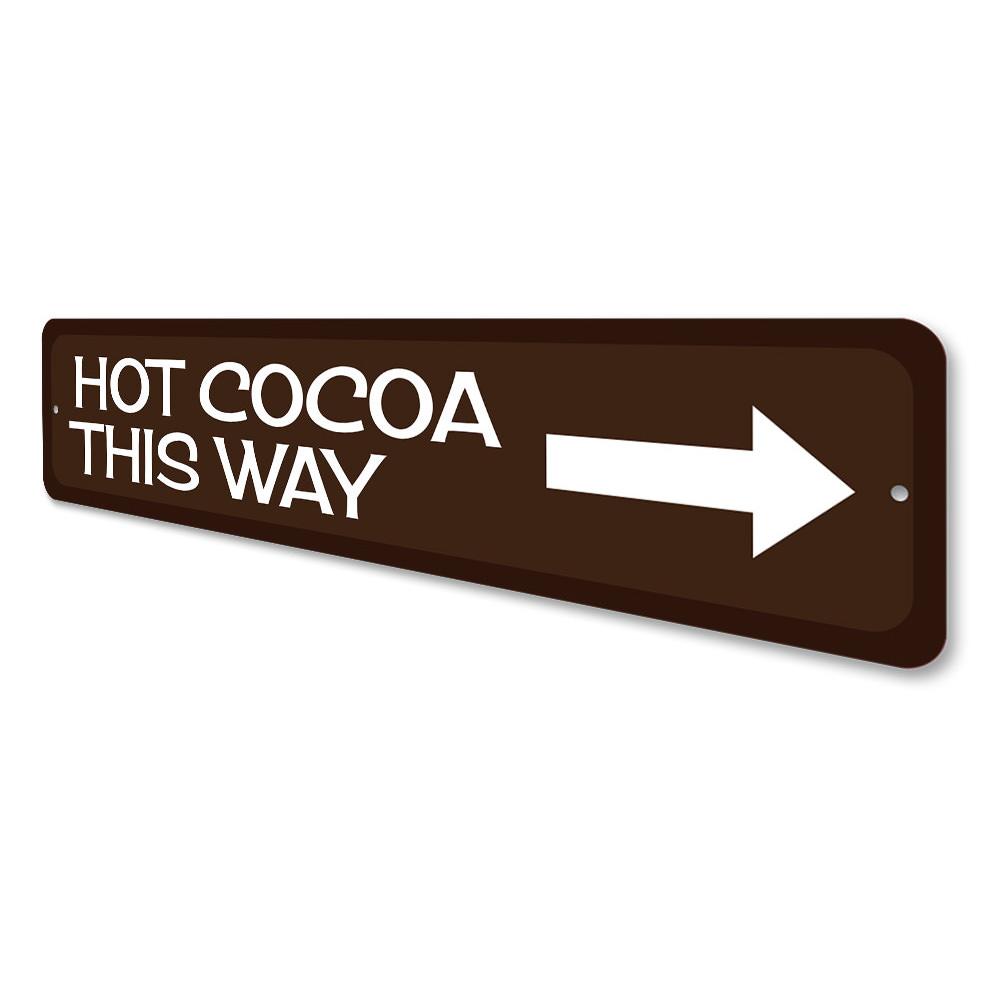 A festive Hot Cocoa Arrow Sign made of high-quality aluminum, featuring a charming design perfect for holiday decorations.