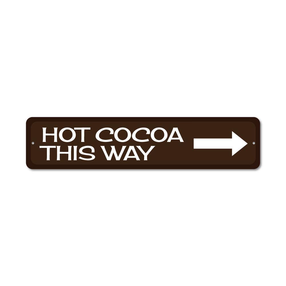 A festive Hot Cocoa Arrow Sign made of high-quality aluminum, featuring a charming design perfect for holiday decorations.