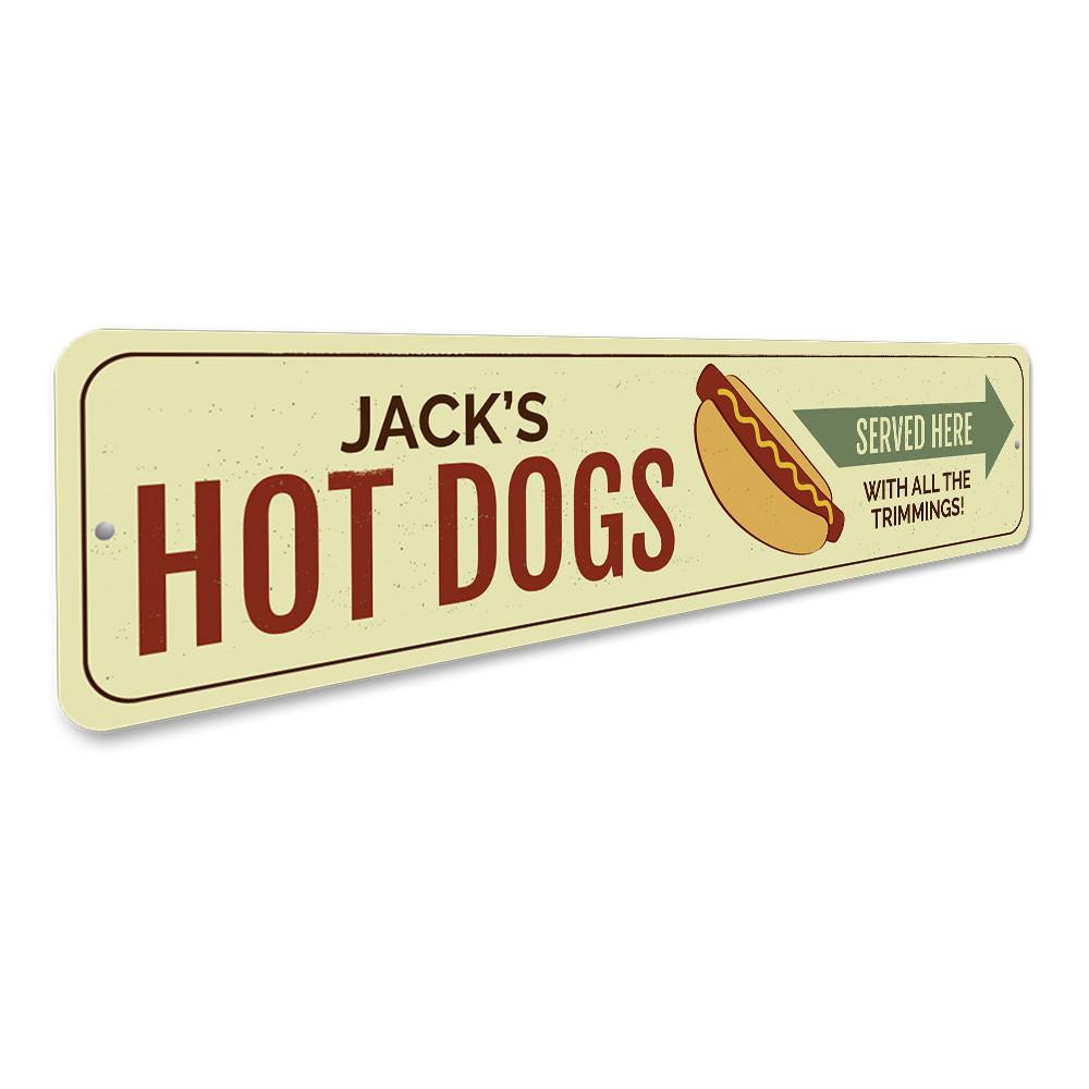 A vibrant aluminum sign reading 'Hot Dogs Served Here', perfect for restaurants and cafes, showcasing quality craftsmanship.